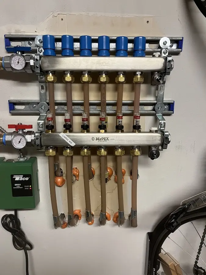 Plumber performing Gas Leak Detection at a residential property in Freeburg